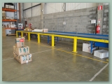 Barrier to Conveyor